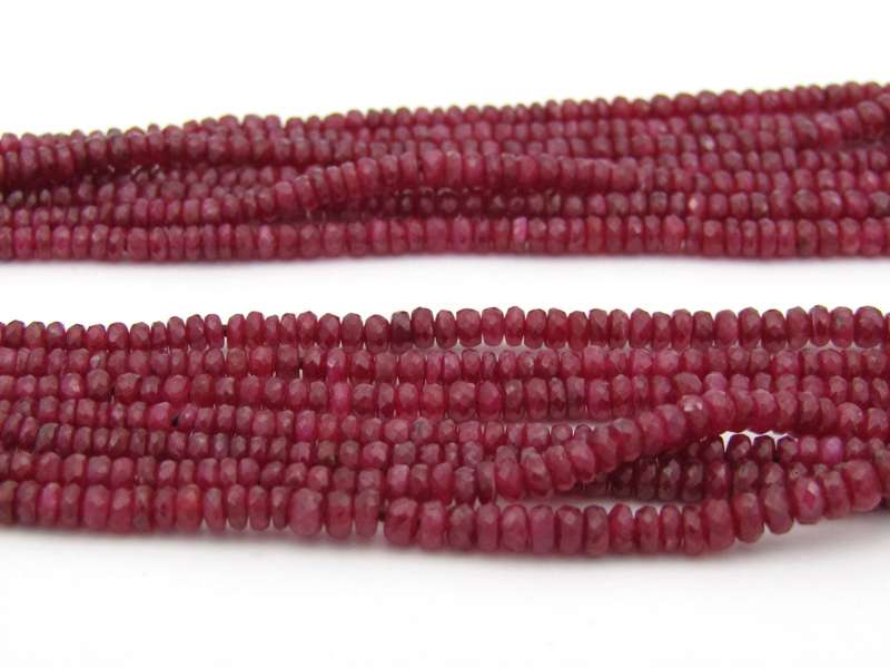 14K gold diamond and 7-strand ruby necklace.