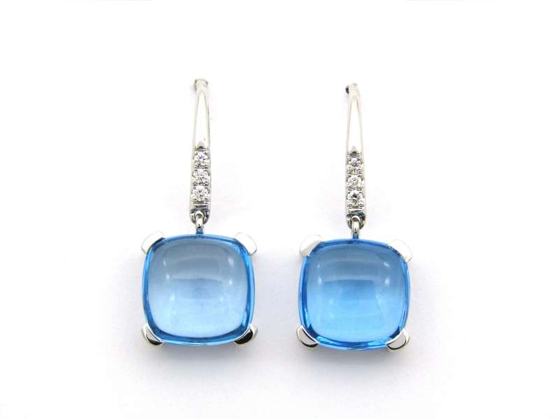 14K gold blue topaz and diamond drop earrings.