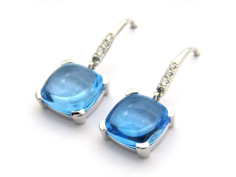 14K gold blue topaz and diamond drop earrings.