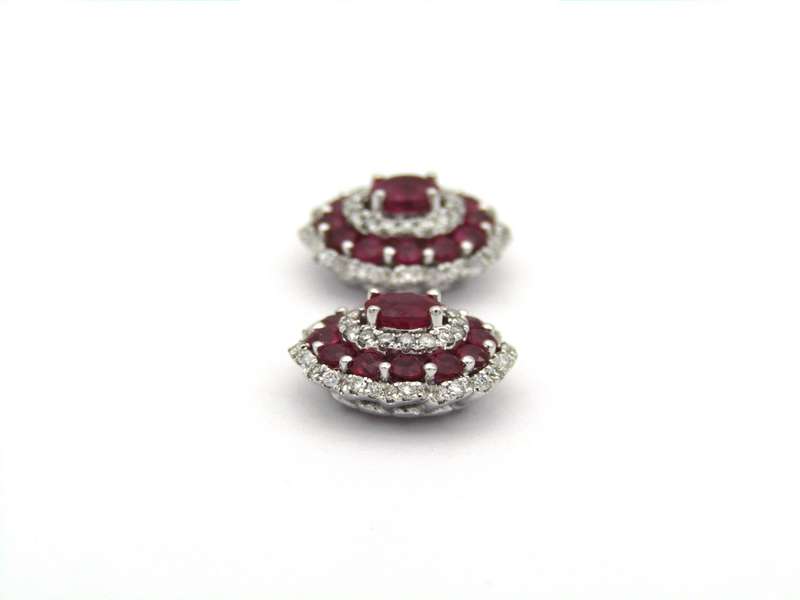 18K gold ruby and diamond earrings.