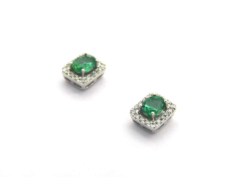 9K gold emerald and diamond earrings.