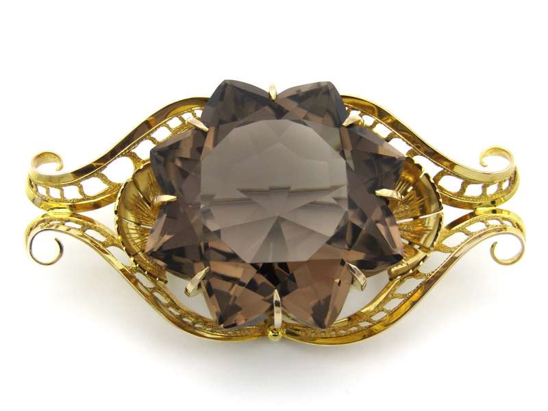 Large 9K gold smoky quartz brooch, circa 1950.