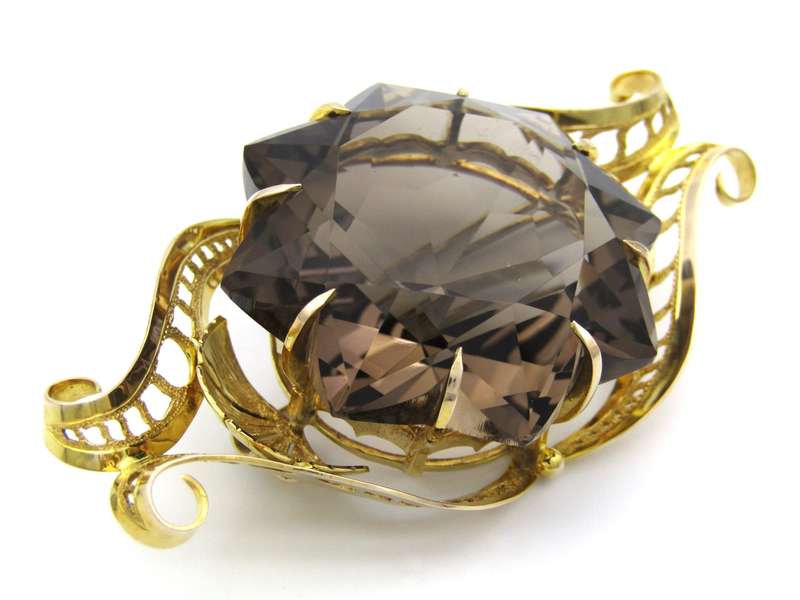 Large 9K gold smoky quartz brooch, circa 1950.