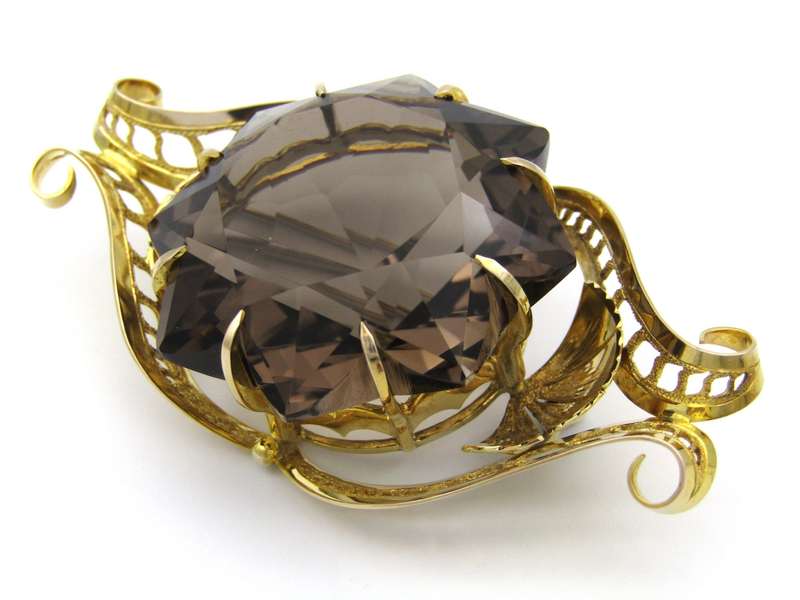 Large 9K gold smoky quartz brooch, circa 1950.