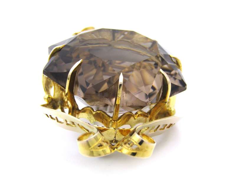 Large 9K gold smoky quartz brooch, circa 1950.