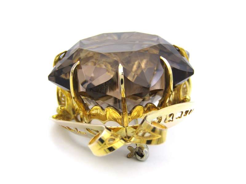 Large 9K gold smoky quartz brooch, circa 1950.