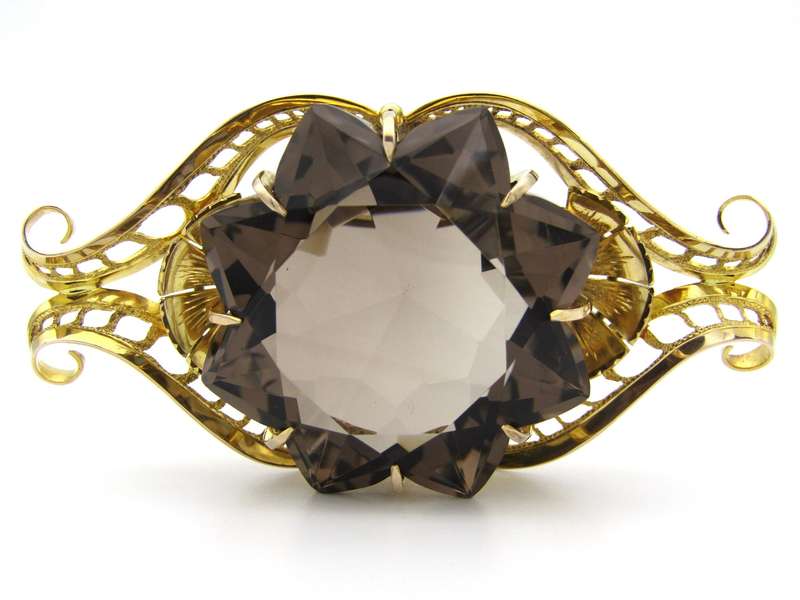 Large 9K gold smoky quartz brooch, circa 1950.