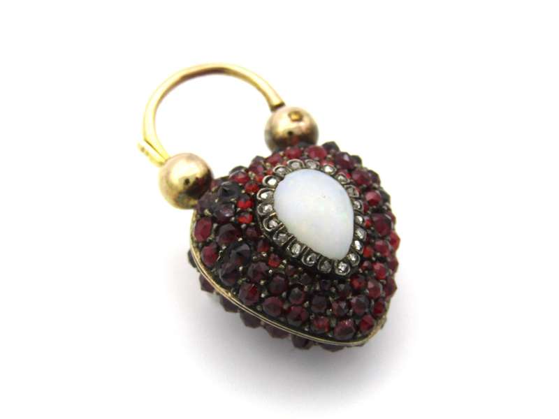 9K gold Victorian opal, garnet, seed pearl, and diamond locket and padlock clasp, circa 1850's.