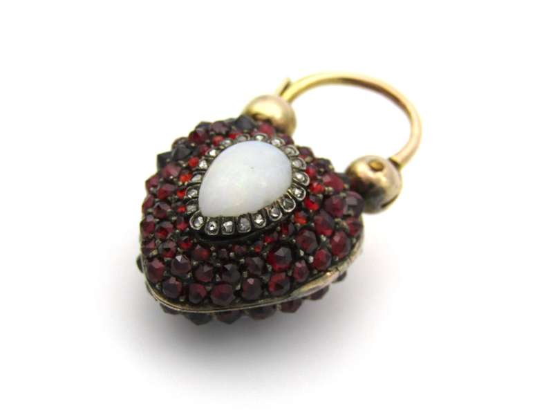 9K gold Victorian opal, garnet, seed pearl, and diamond locket and padlock clasp, circa 1850's.
