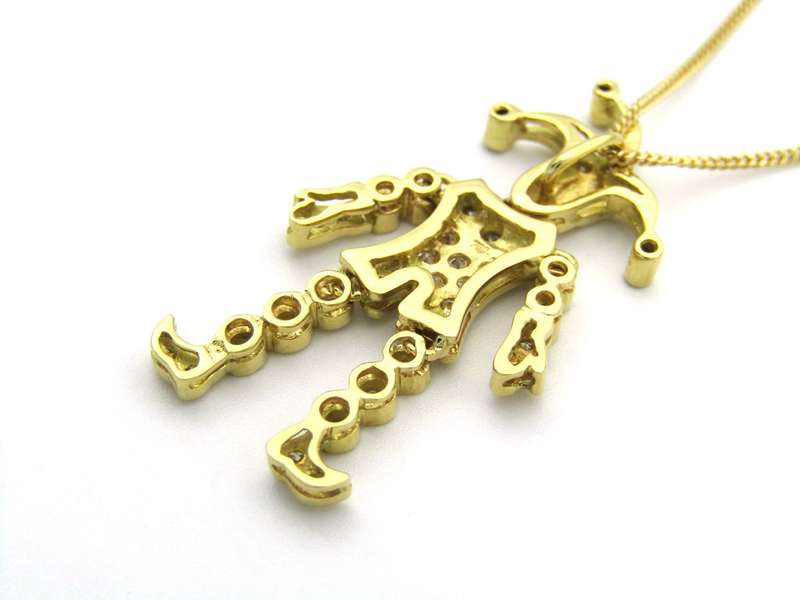 18K gold articulated diamond "Jester" pendant, circa 1980.
