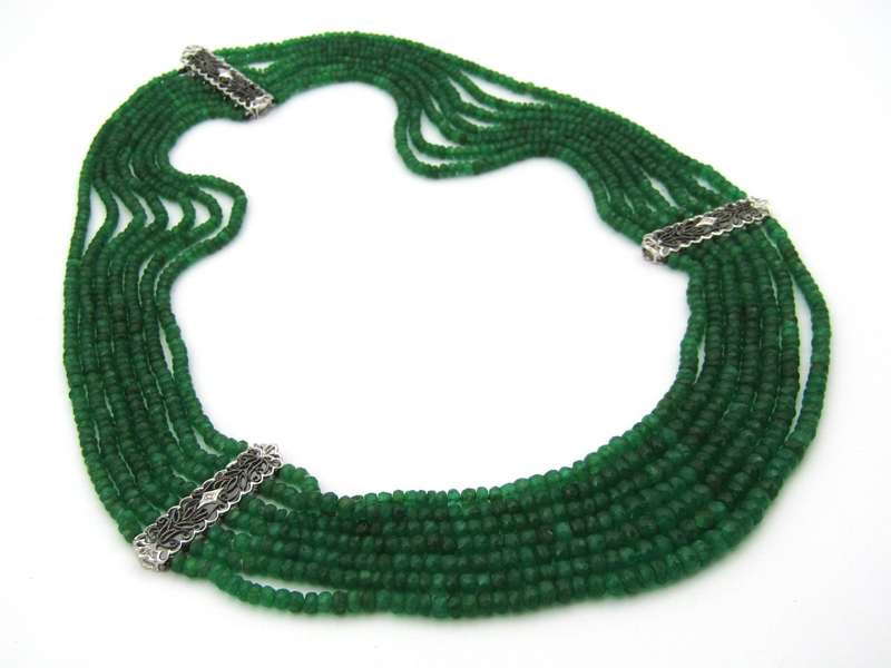 14K gold diamond and 7 strand emerald necklace.