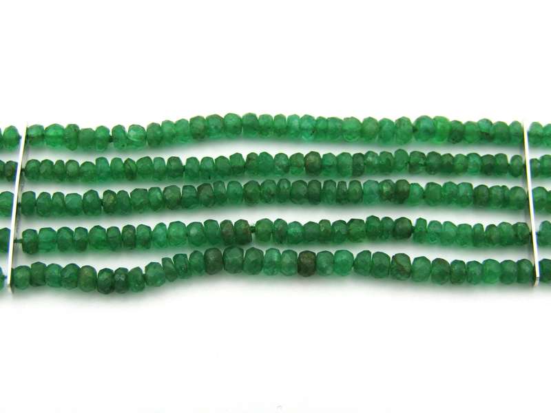 14K gold diamond and 5 strand emerald bracelet.