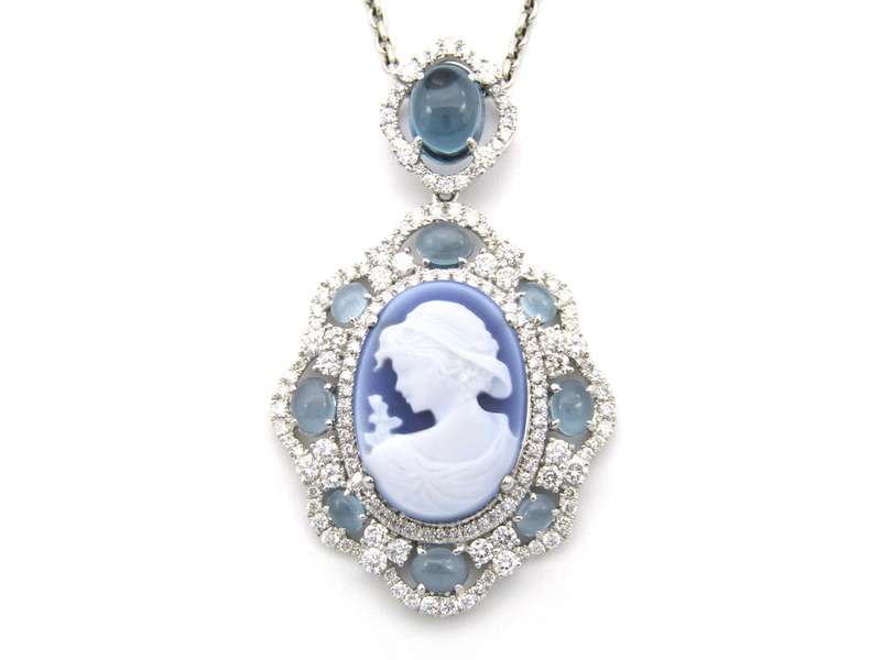 18K gold agate cameo, blue topaz and diamond pendant.