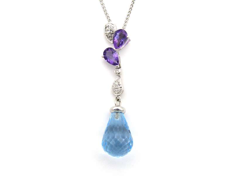 18K gold blue topaz, amethyst, and diamond pendant.