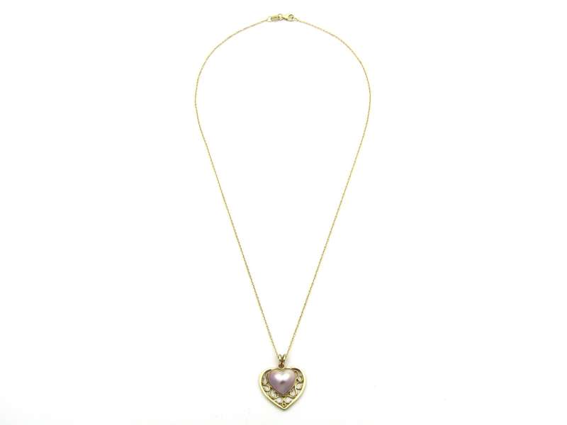 9K gold pink mabe pearl filigree heart pendant.