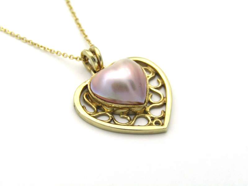 9K gold pink mabe pearl filigree heart pendant.