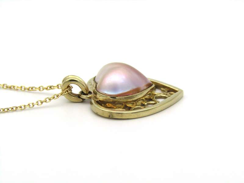 9K gold pink mabe pearl filigree heart pendant.