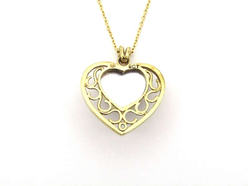 9K gold pink mabe pearl filigree heart pendant.