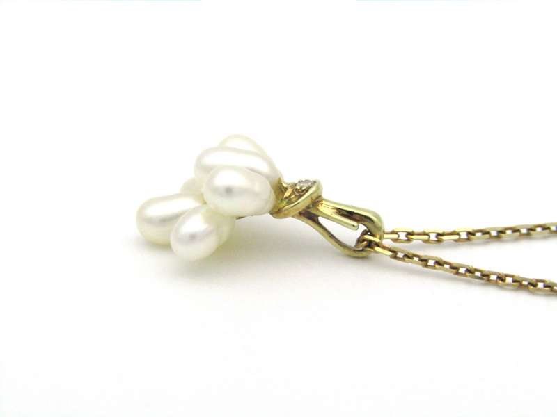 9K gold pearl 'tassel' and diamond pendant.