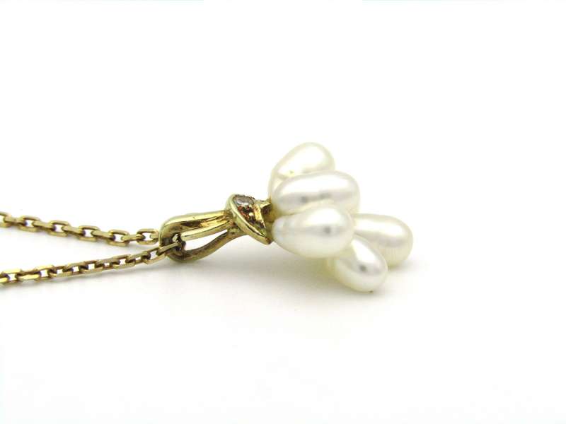 9K gold pearl 'tassel' and diamond pendant.