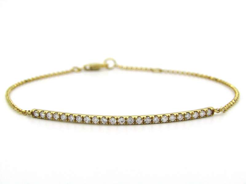 18K gold diamond bar bracelet.