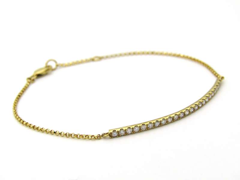 18K gold diamond bar bracelet.