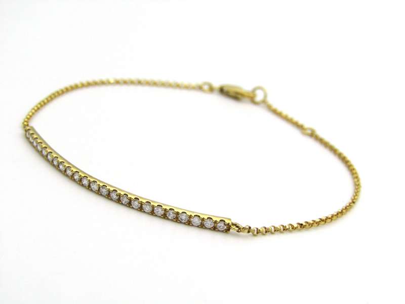 18K gold diamond bar bracelet.