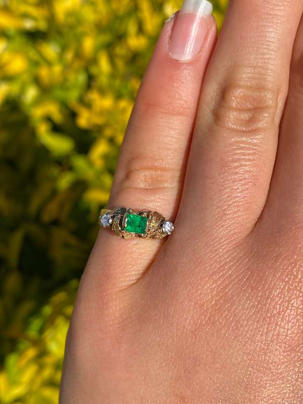 18K gold emerald and diamond ring, circa 1940's.