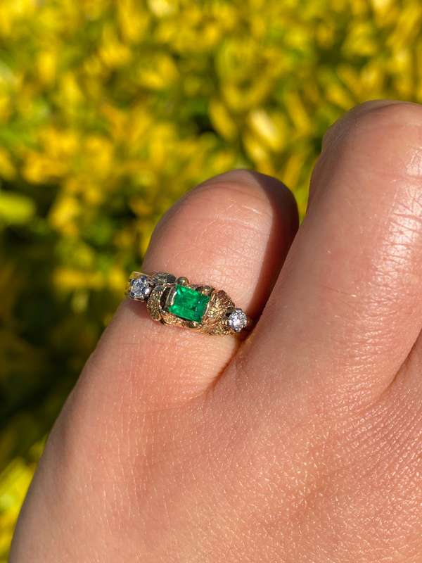 18K gold emerald and diamond ring, circa 1940's.