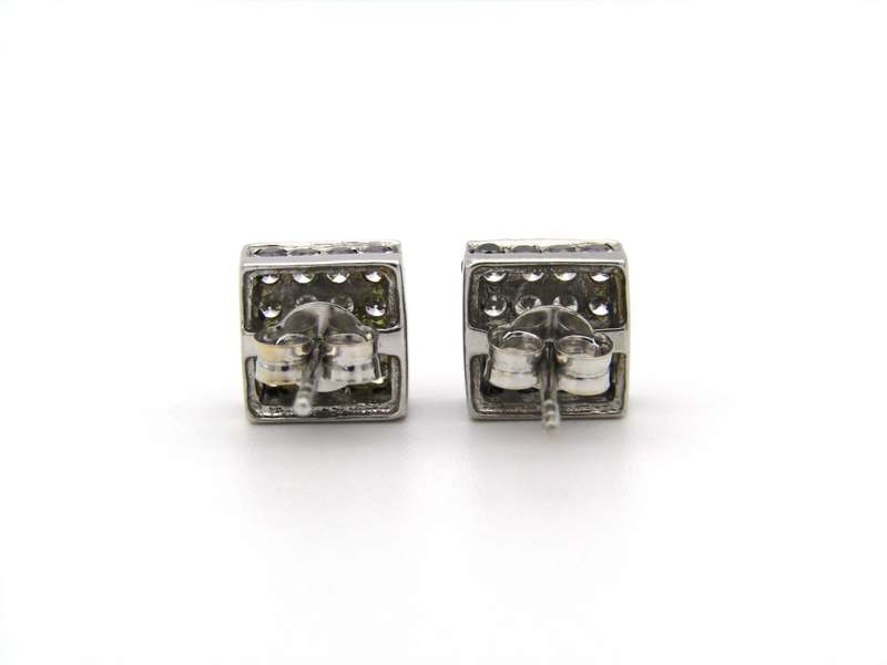 18K gold black and colourless diamond earrings.