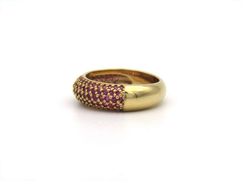 18K gold pav ruby bombe ring.