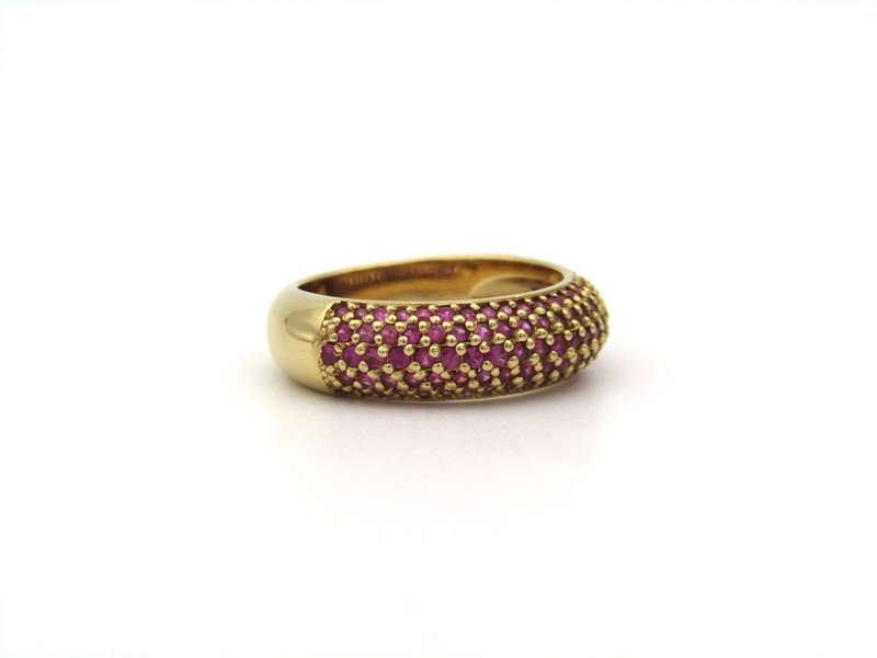 18K gold pav ruby bombe ring.