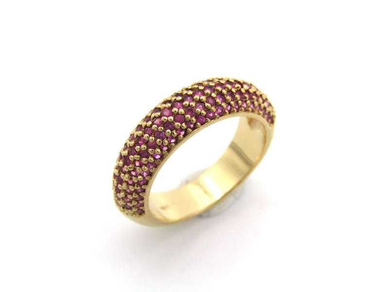 18K gold pav ruby bombe ring.