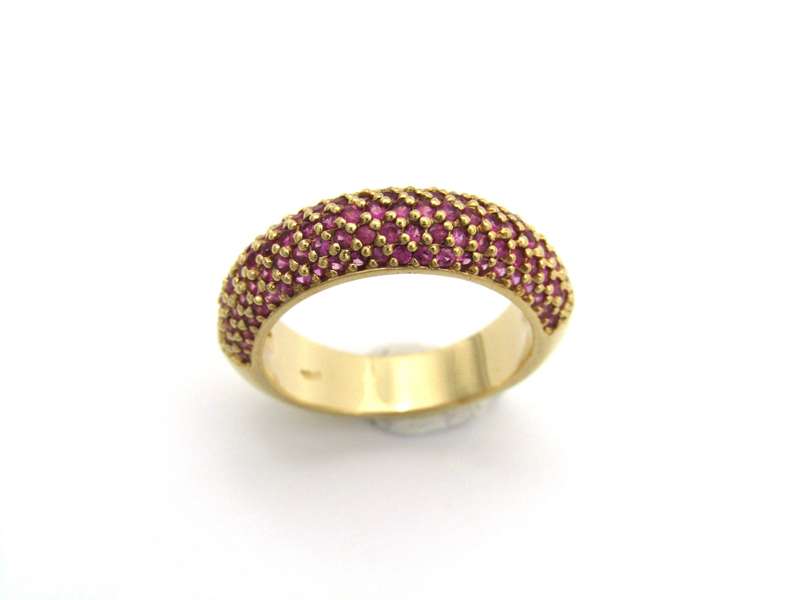18K gold pav ruby bombe ring.