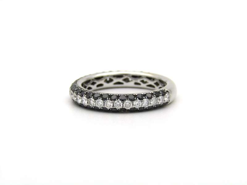 18K gold black and colourless diamond ring.