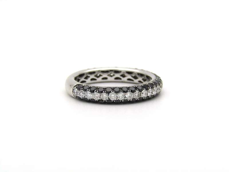 18K gold black and colourless diamond ring.