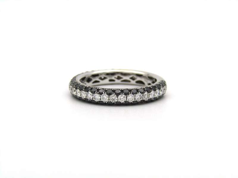 18K gold black and colourless diamond ring.