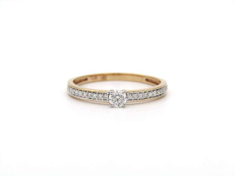 18K gold diamond ring.