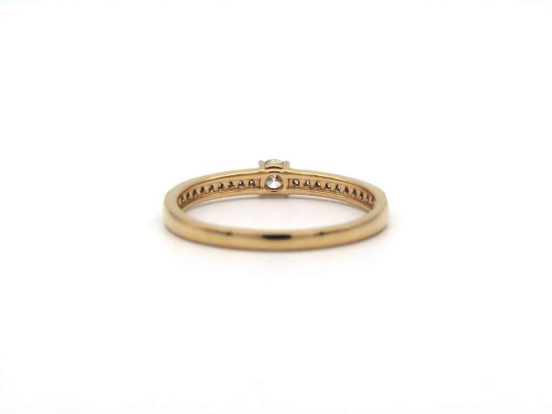 18K gold diamond ring.