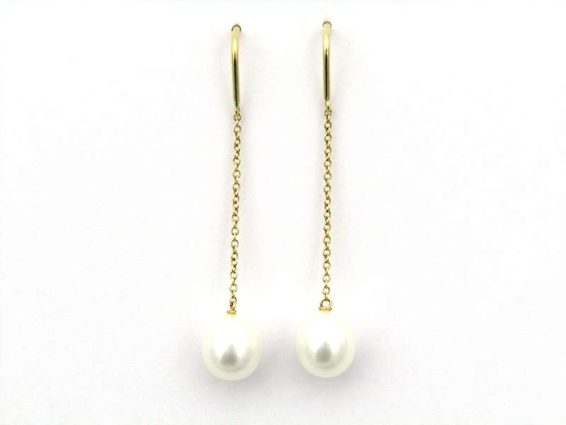 18K gold Tiffany & Co. "Pearls by the Yard" chain earrings.
