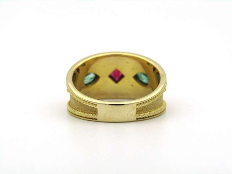 14K gold ruby and emerald ring.