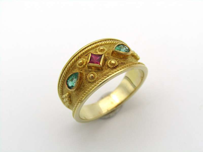 14K gold ruby and emerald ring.