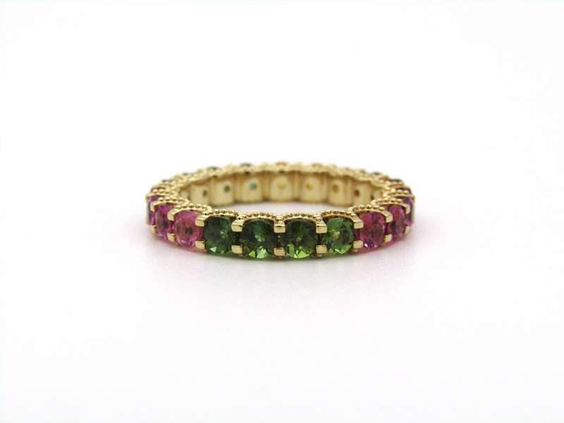 14K gold tourmaline eternity ring.
