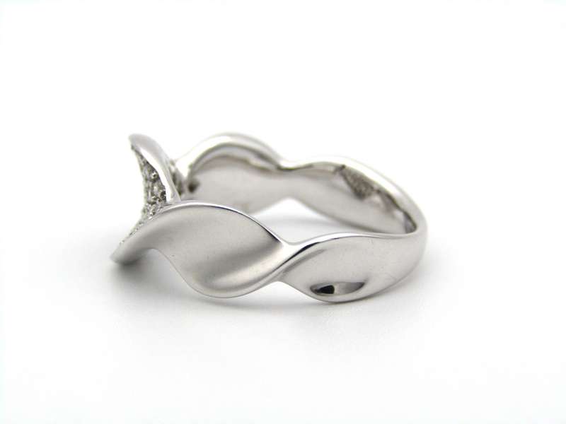 18K gold twist diamond ring.