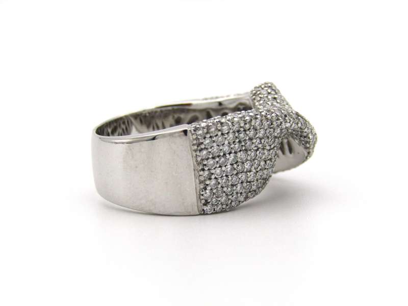 18K gold diamond twist ring.