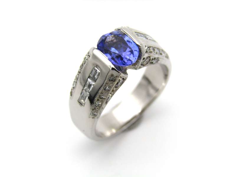 9K gold tanzanite and diamond ring.