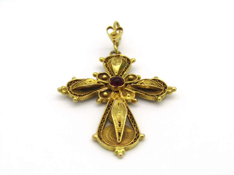 18kt gold filigree ruby cross, Circa 1940.