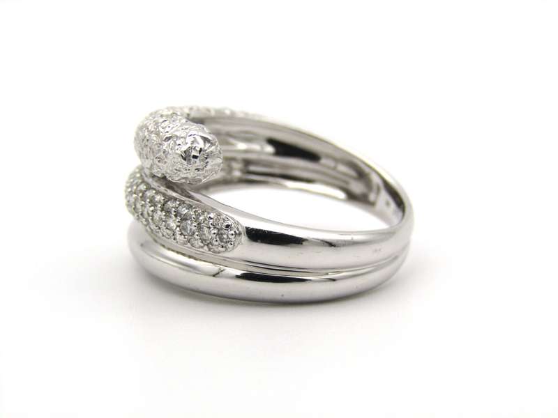 9K gold diamond swirl ring.