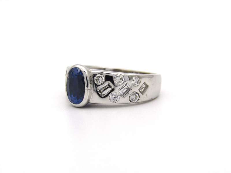 18K gold sapphire and diamond ring.