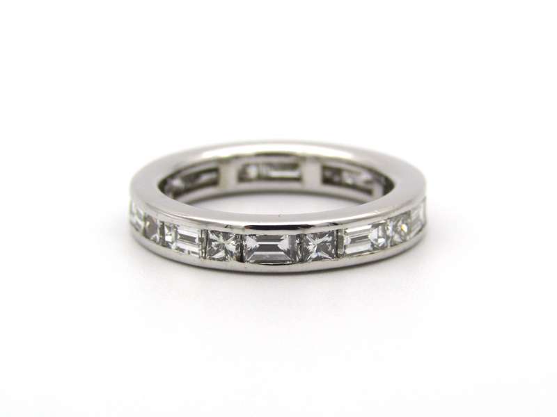 18K gold diamond eternity ring.
